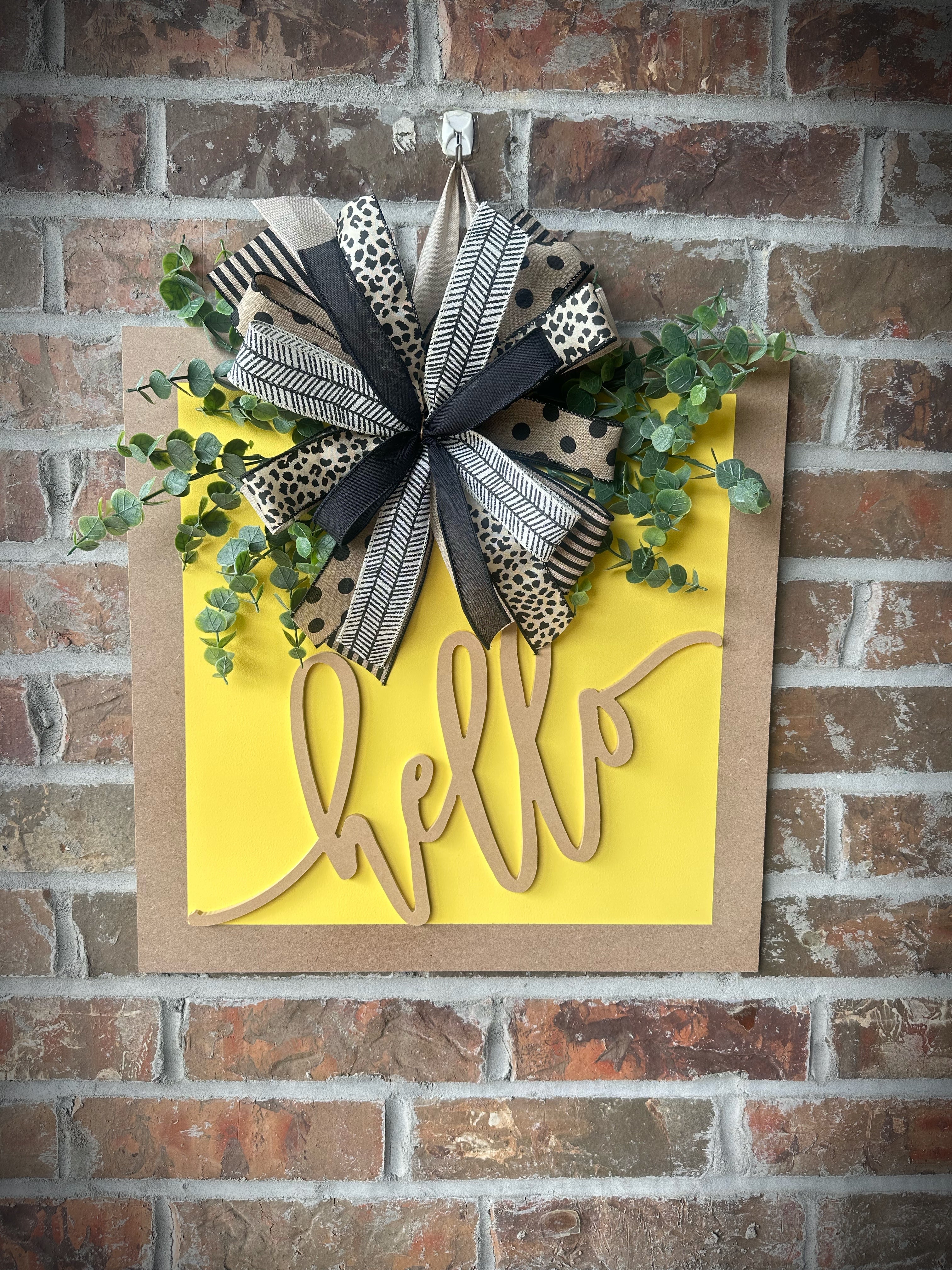 Yellow square door hanger